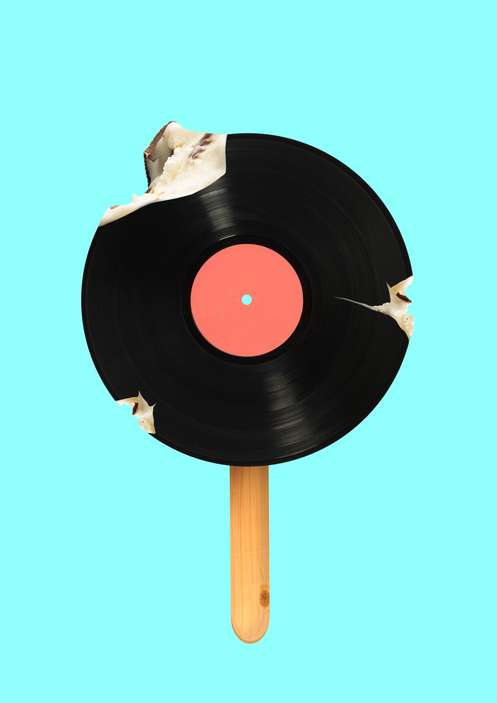 An alternative icecream. Meloman wanna bite a piece of immortal music. Vinyl record formed icecream on a wooden stick against blue sky colored background. Modern design. Contemporary art collage.